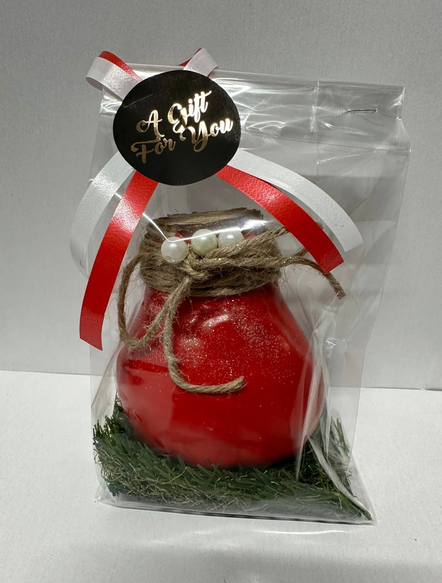 Wachsamaryllis rot in Geschenkverpackung